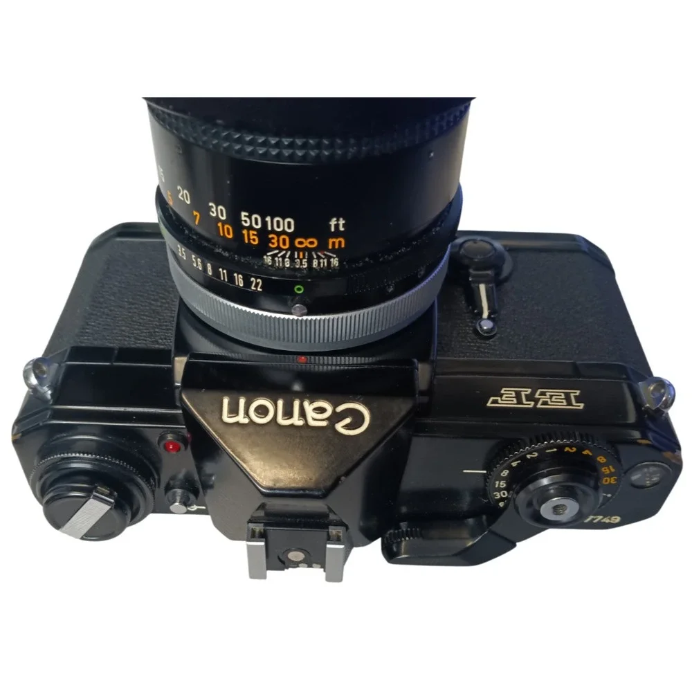 Vintage Canon EF SLR 35mm Film Camera with 135‎ mm Zoom Lens, Made in Japan